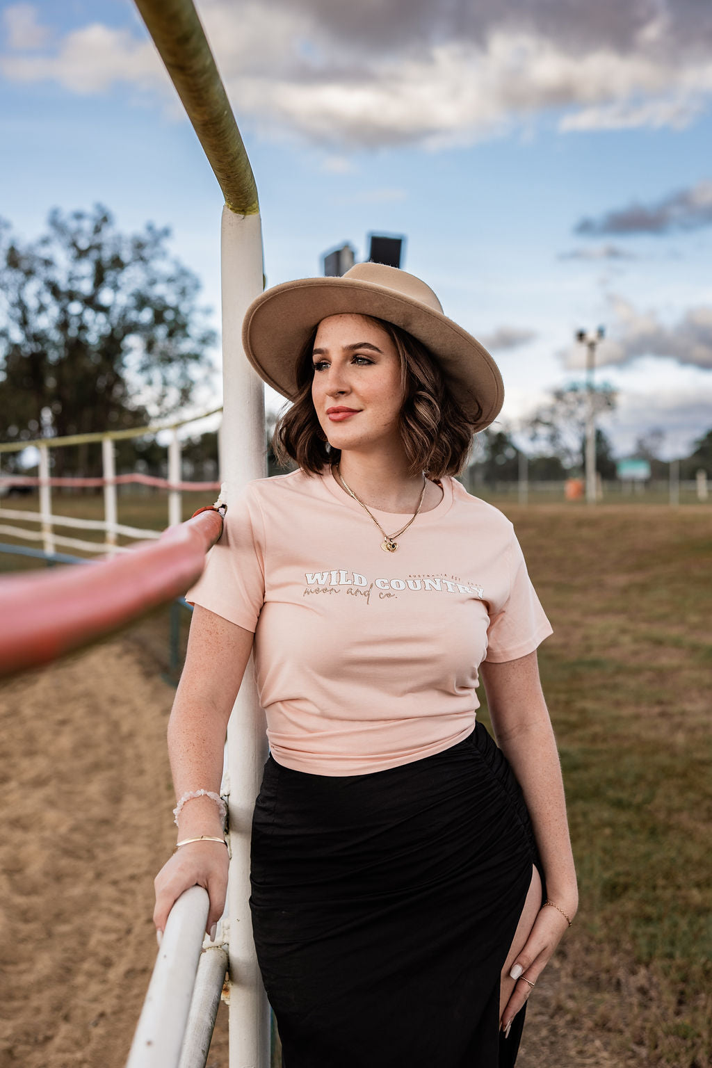 From "baling" hay to getting"bailed" up by cattle in the yards, our BALED UP Tee in Pale Pink is a wardrobe essential. Go from paddock to pub with this simple chest design&nbsp;tee.&nbsp;
